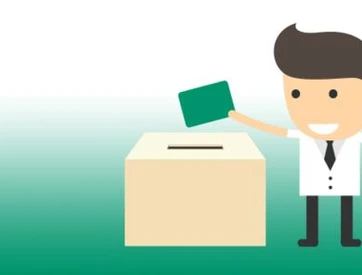 Figur wirft Stimmzettel in Wahlurne